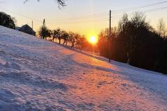 Sonnenuntergang mit Schnee